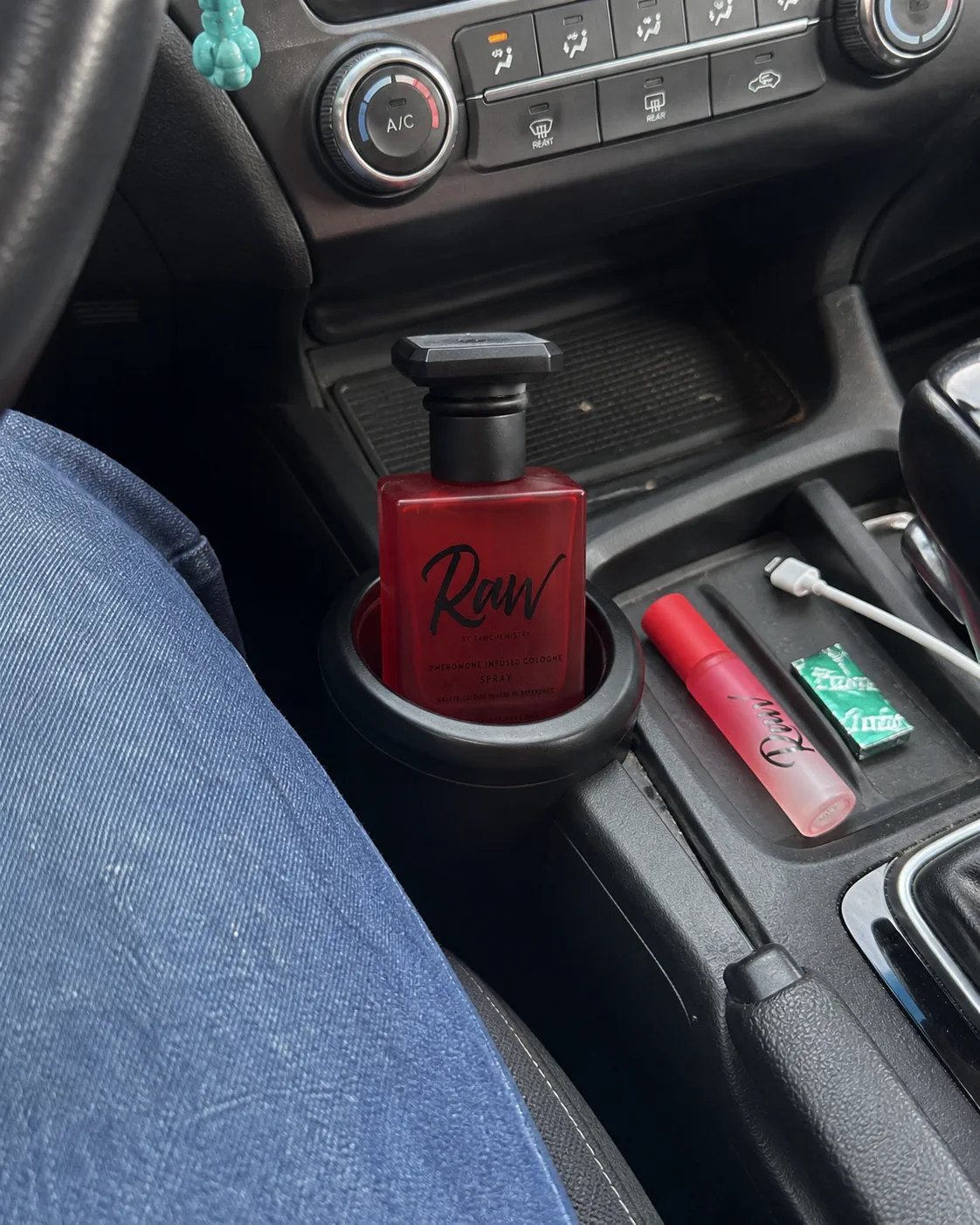 RAW spray and travel roll-on in a normal car console