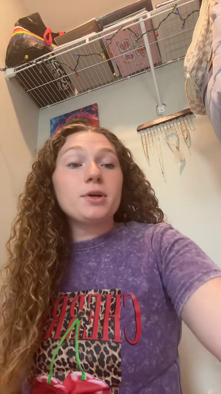 Ashley discussing her damp-hair routine in the original creator video