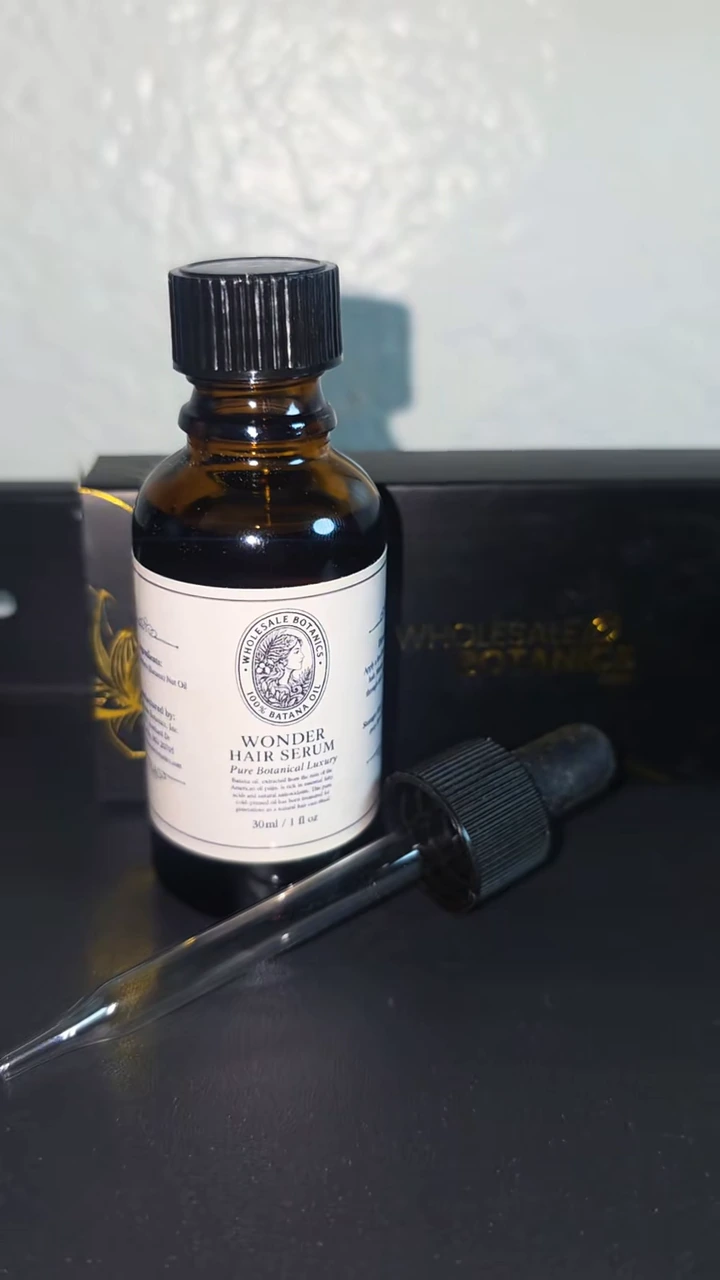 A close look at the original Wonder Hair Serum bottle and packaging filmed by Cepria